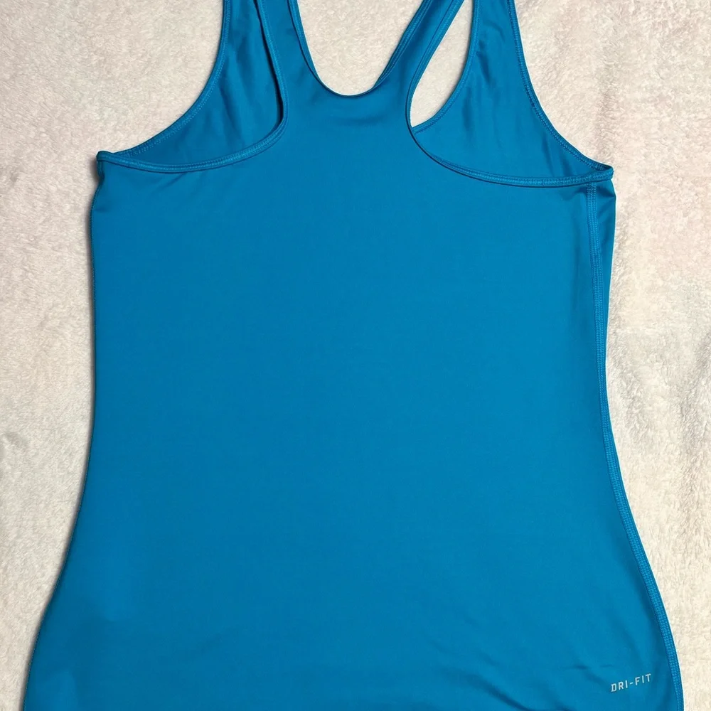 Nike Women’s Teal Tank with Neon Yellow Swoosh